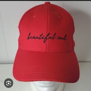 Vibrant Red Cap with Embroidered Text "Beautiful Soul" In Black Cursive Text.